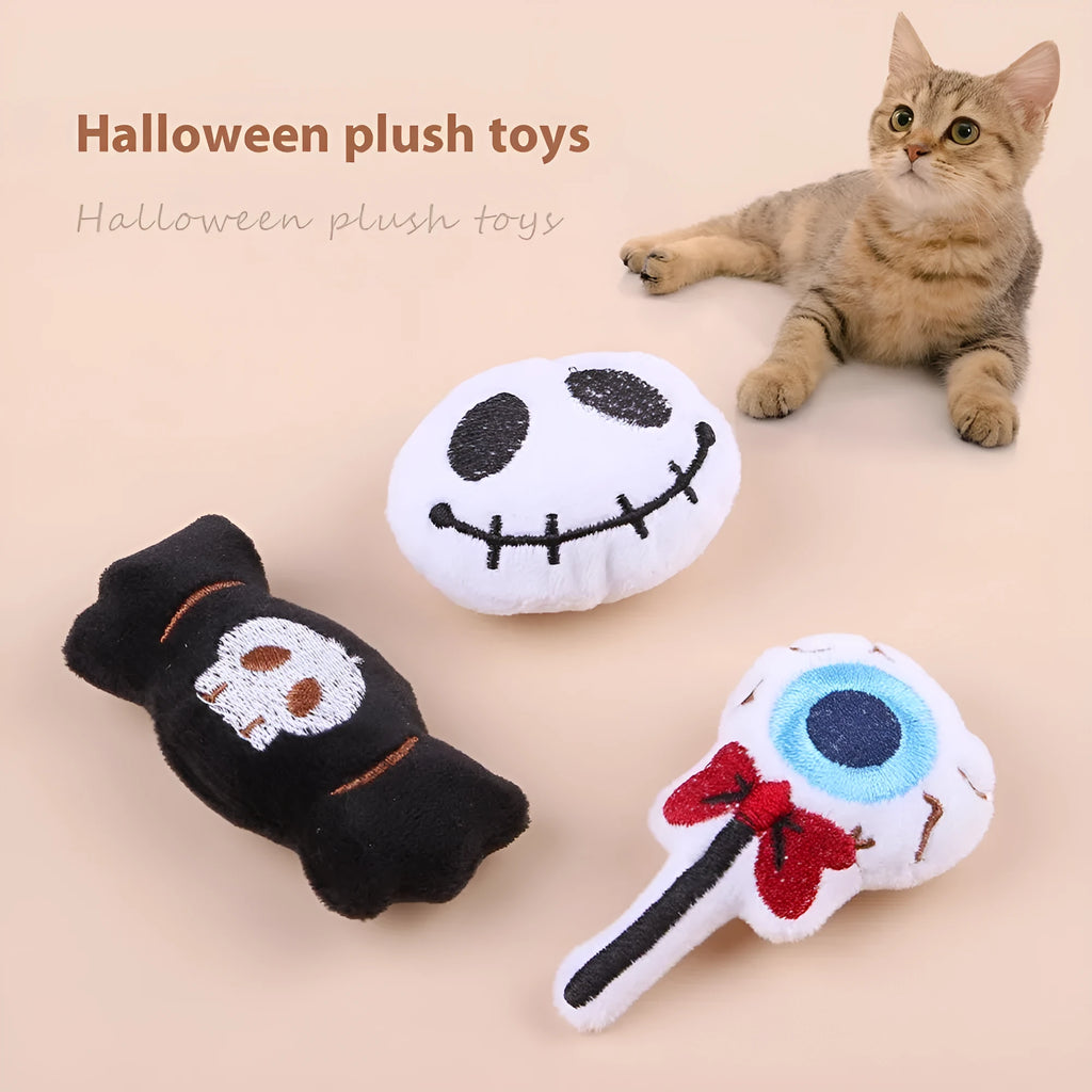 Colourful plush cat tease stick with candy, eyes and skull designs on small wand toy