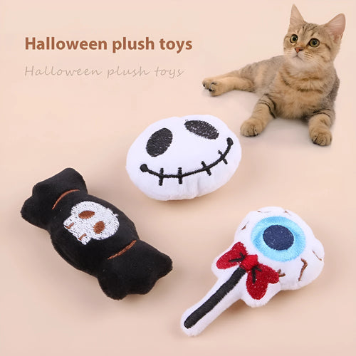 Colourful plush cat tease stick with candy, eyes and skull designs on small wand toy