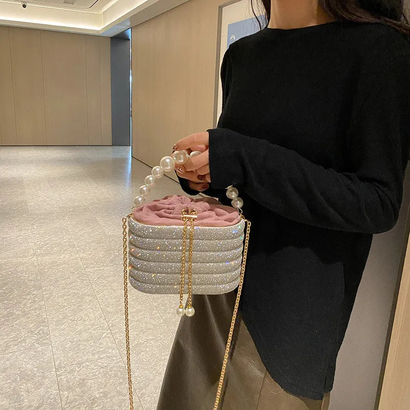 Retro style women's crossbody bag with pearl beading decoration and round shape