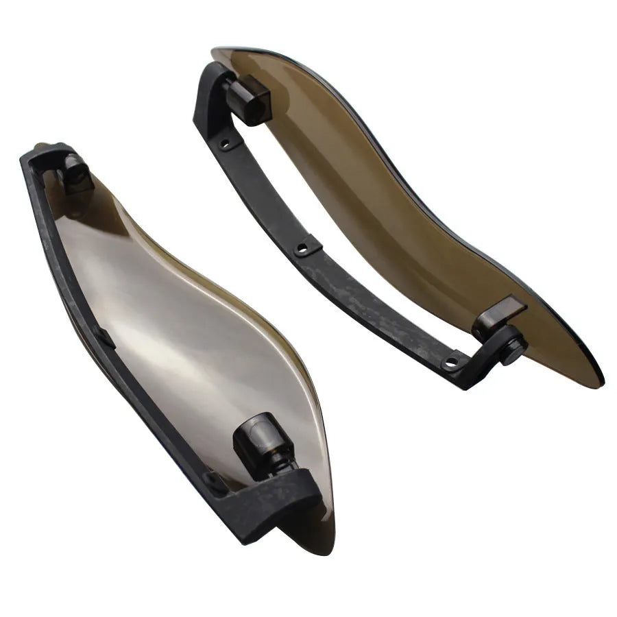 Pair of smoked ABS plastic windscreen side wings for a Harley Davidson Road Glide motorcycle.