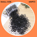 Assortment of colourful thin TPU baby hair ties in a clear reusable plastic container.