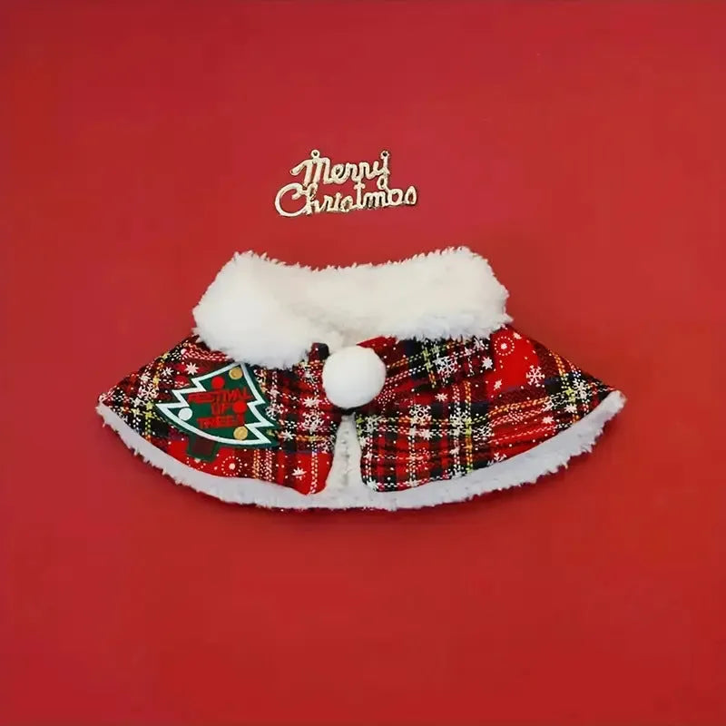 Red pet Christmas scarf with a jingle bell on a dog, showing the polyester fabric and festive design.