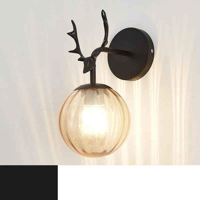 Modern round glass wall lamp with Nordic minimalist design on a wall.