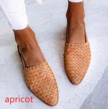 Baotou flat sandals with a buckle strap and pointed toe, shown in one of six available colours.