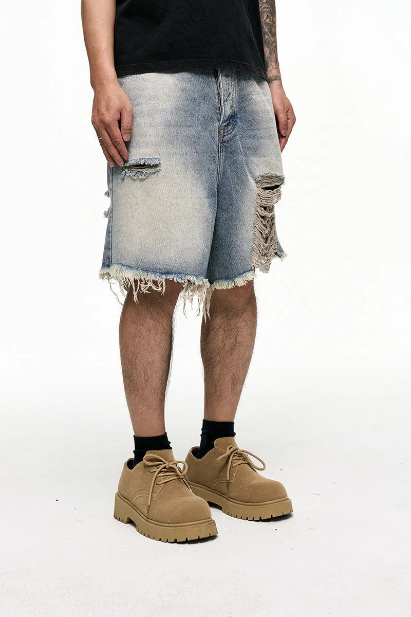 Light blue men's retro washed denim shorts with baggy wide leg fit