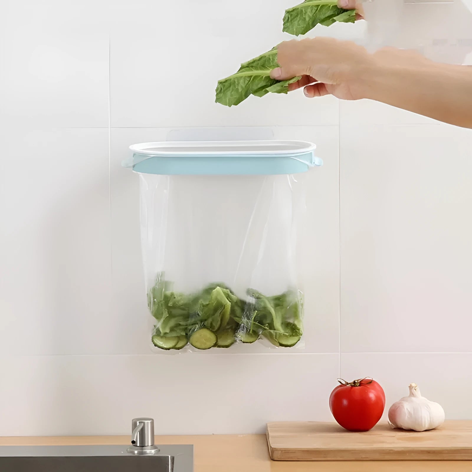 Blue plastic kitchen garbage bag storage rack on cabinet shelf