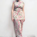 Two-piece printed chiffon dress set with long sleeves and high waist design showing separate skirt and top