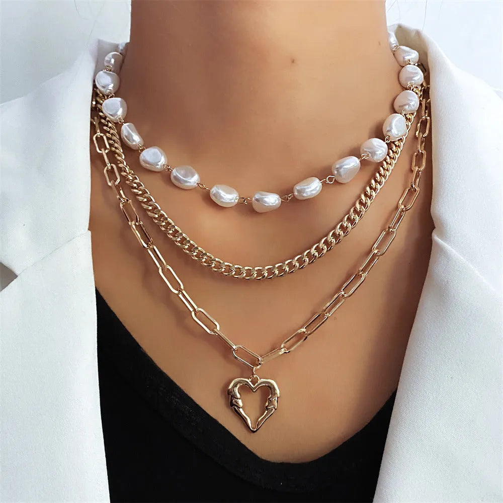 Vintage gold necklace with heart pendant on pearl chain, adjustable 41-50cm length