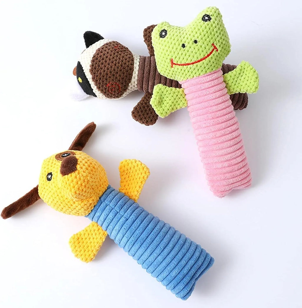 A cloth stuffed animal dog chew toy with a squeaker, shown next to a ruler measuring 19 cm in length.