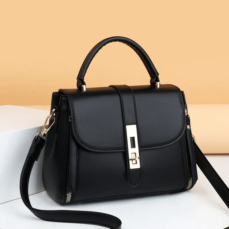 Women's soft leather shoulder bag in messenger style with adjustable strap