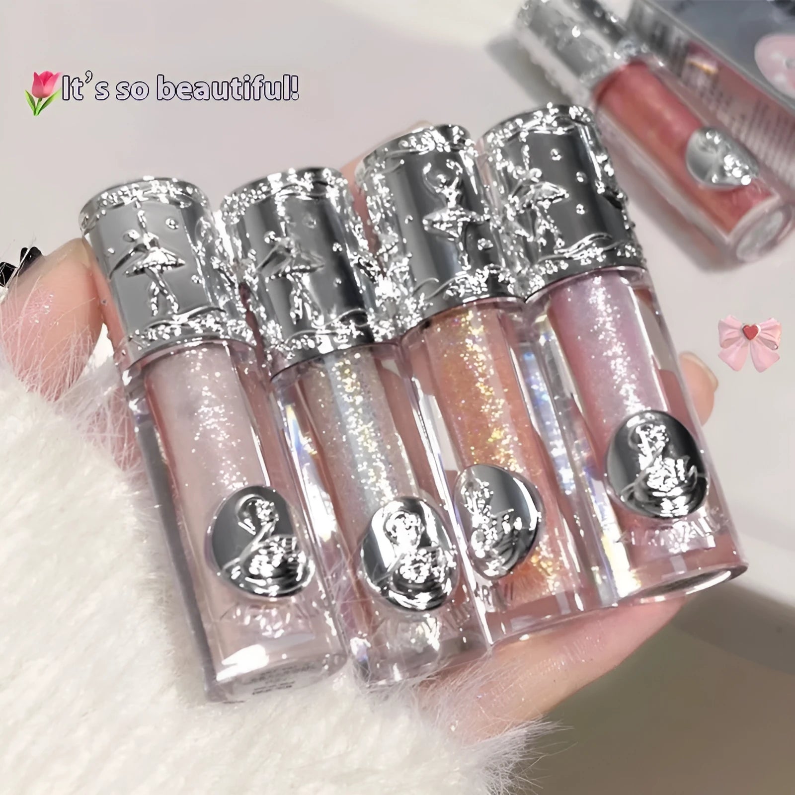 Ballet brand liquid glitter eye shadow tube shown in one of five colours: Starry Sakura Field, Doll Logs, Butterfly Paradise, Nutcracker, or Pillow Fairy Tales.