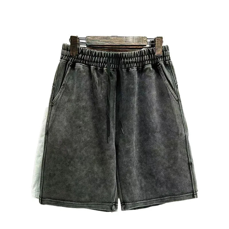 Men's cotton distressed shorts in loose fit straight-leg design