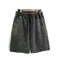 Men's cotton distressed shorts in loose fit straight-leg design