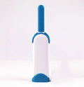 Blue reusable pet hair removal comb with double-sided brush and self-cleaning base for furniture.