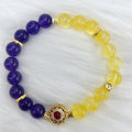 Handmade women's amethyst crystal bracelet with yellow and purple stones
