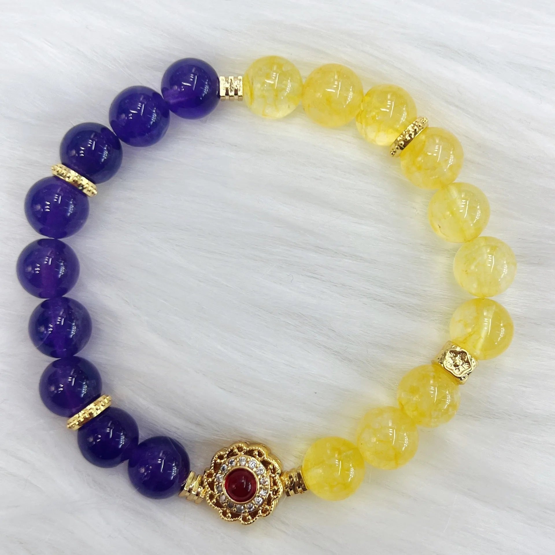 Handmade women's amethyst crystal bracelet with yellow and purple stones