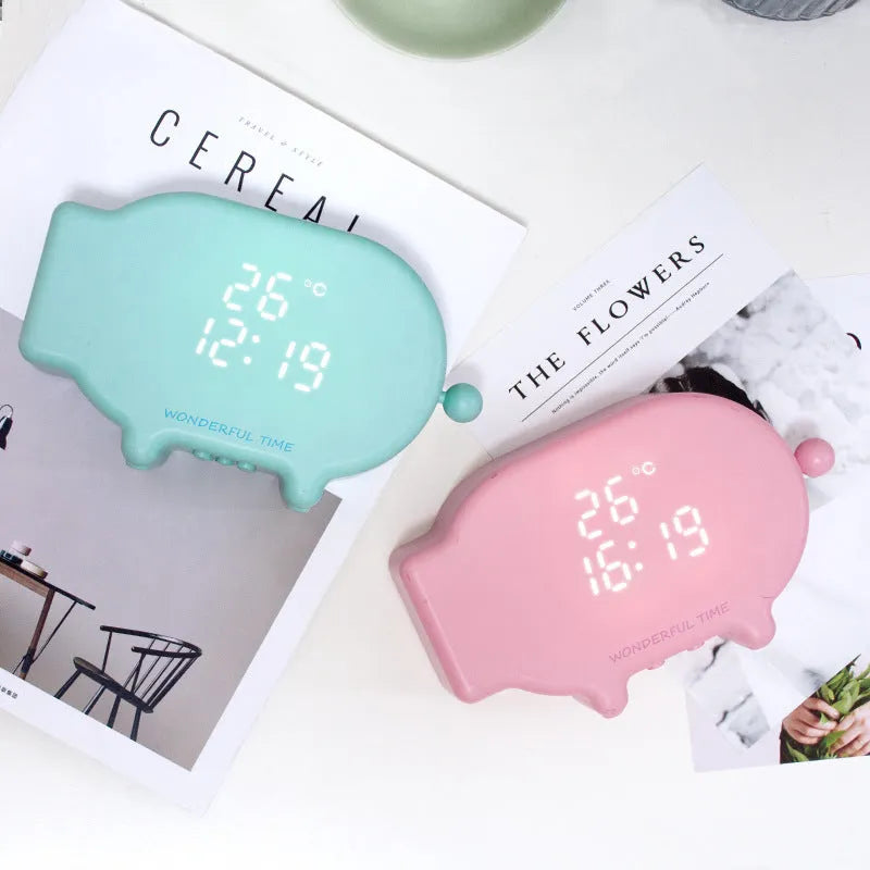 Multifunctional LED alarm clock with temperature display and USB port in blue or pink ABS plastic