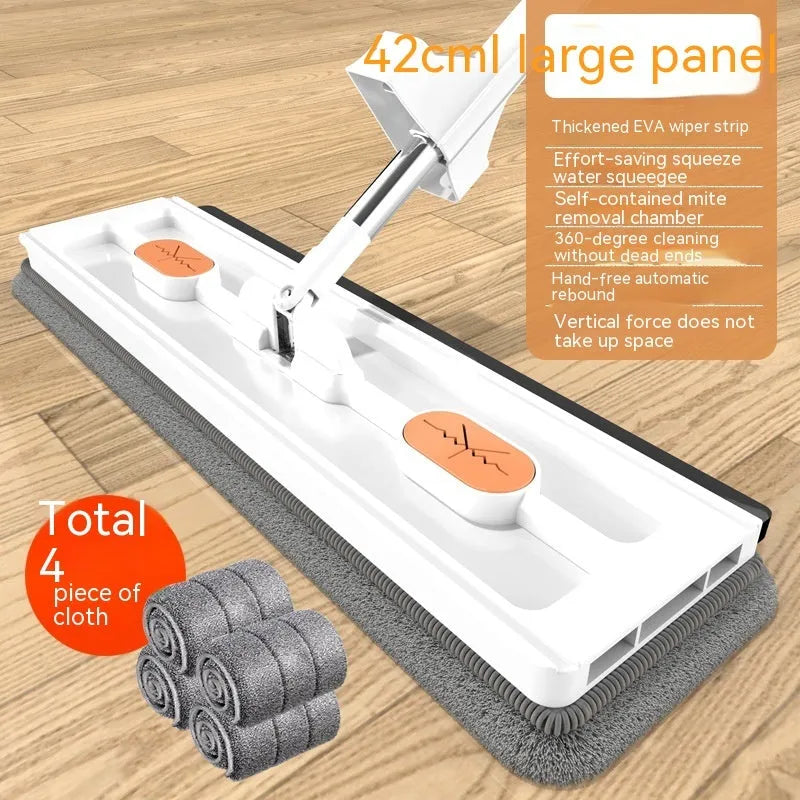 Large flat mop with long stainless steel handle and blue cleaning cloth on a hard floor.