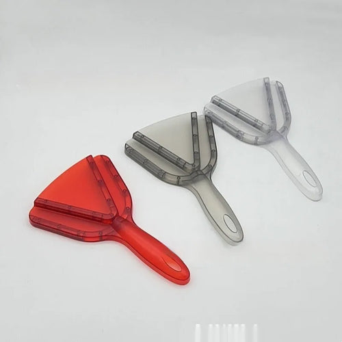 Red adjustable telescopic can opener and bottle opener with non-slip handle on a kitchen counter.