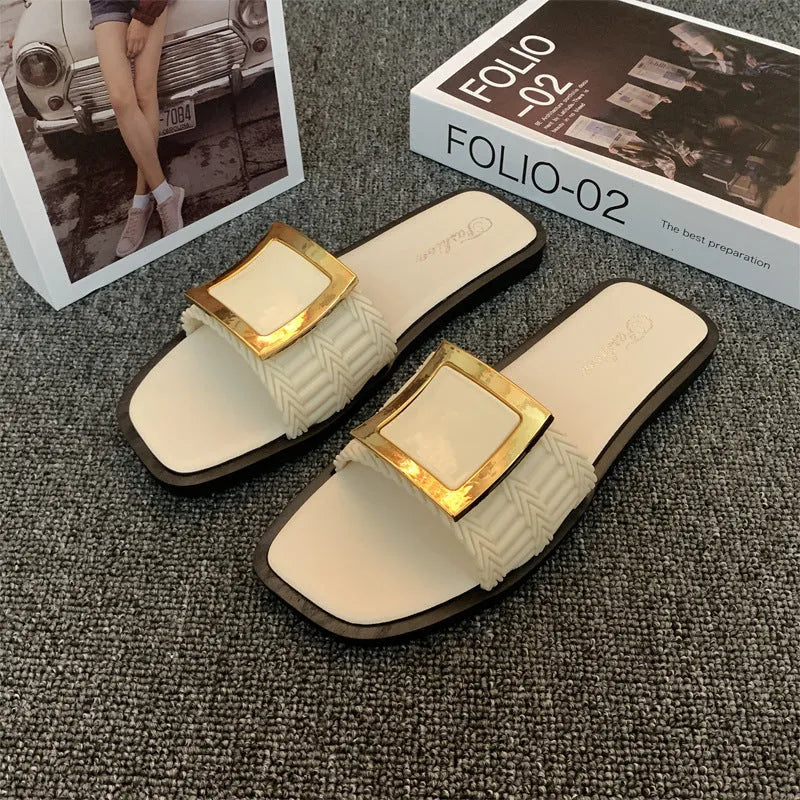 Women's apricot casual flat slippers with a PVC sole on a plain background.