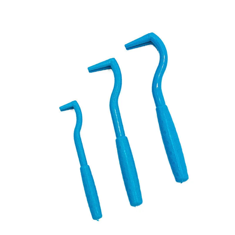Three plastic pet tick removal hooks in blue or green colours