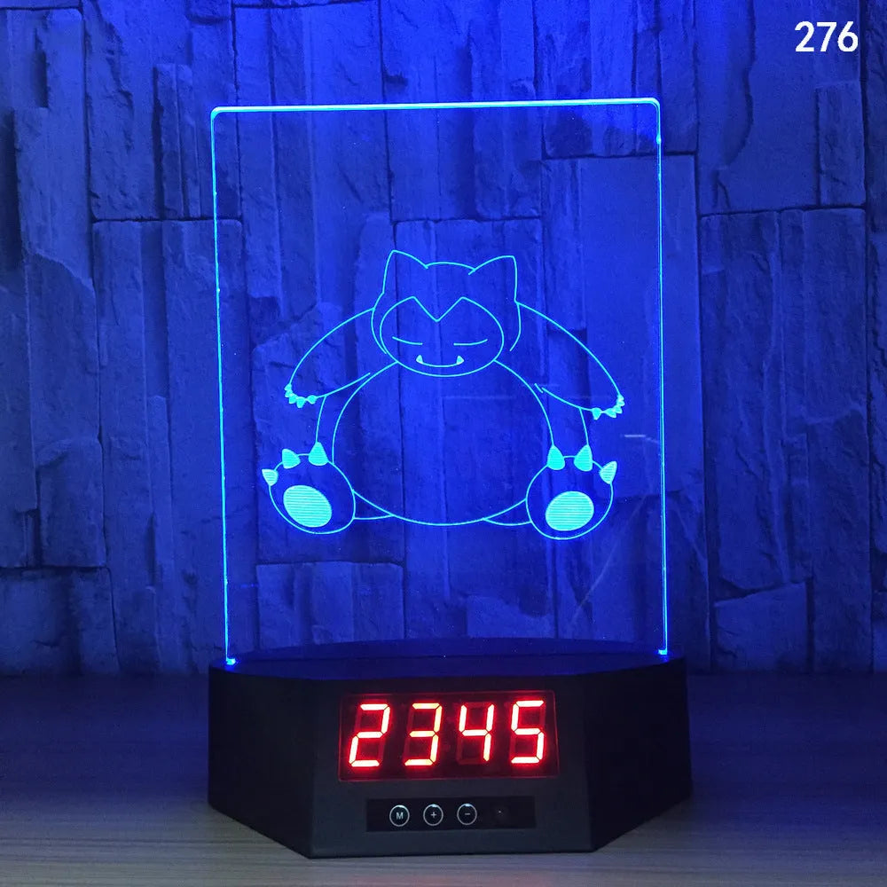 Glowing blue dolphin 3D night light with wireless charging base and remote control on wooden table