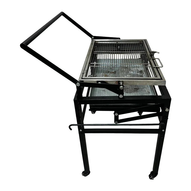 Large foldable L-size charcoal BBQ stove with grill, shown in a garden setting.