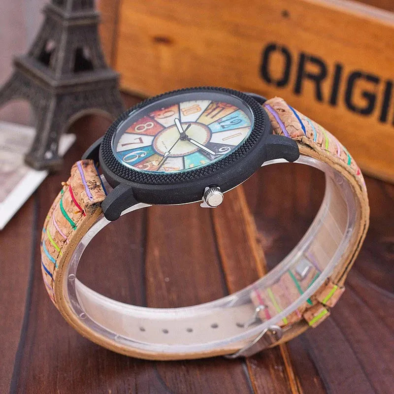 Women's vintage style quartz watch with brown leather strap and 37mm round silver dial