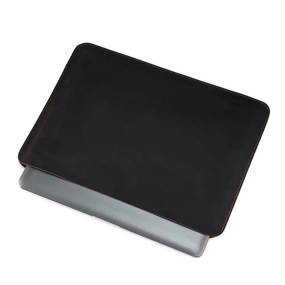 Brown genuine cowhide horizontal computer liner bag showing laptop compartment