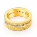 Gold-coloured geometric zircon ring for women showing openwork design and stone detail