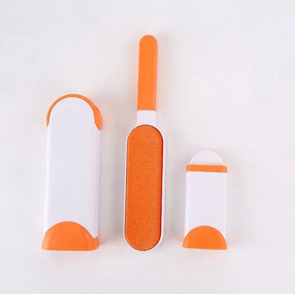Blue reusable pet hair removal comb with double-sided brush and self-cleaning base for furniture.