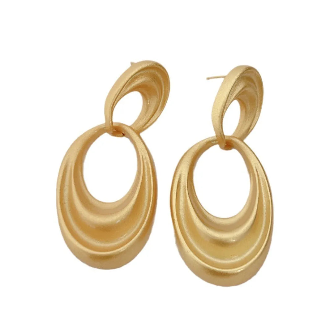 Women's copper earrings with a double circle design and quicksand colour in a French retro style.
