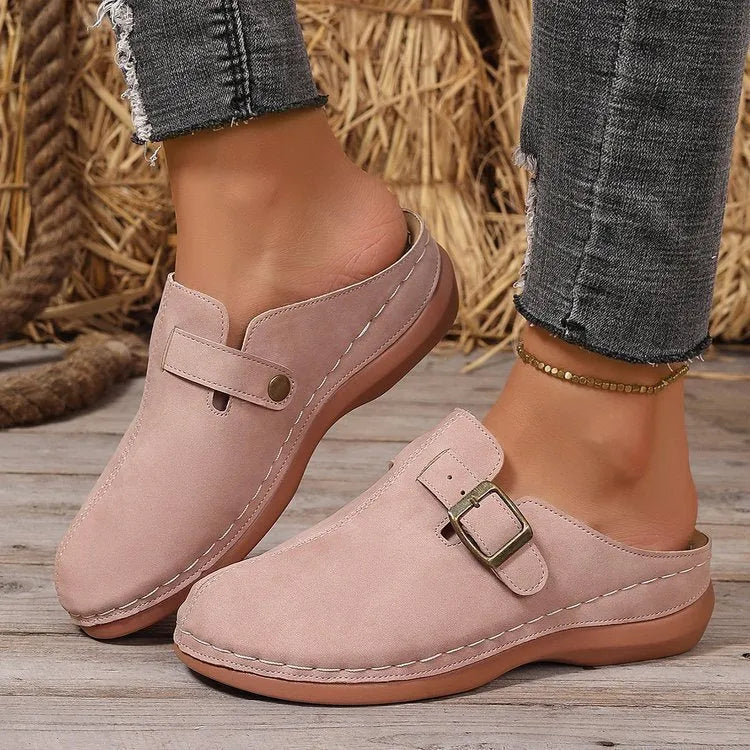 Women's casual wedge slippers in various colours with closed toe design and rubber sole