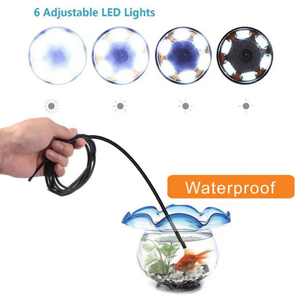 Android mobile phone connected to a USB endoscope with flexible cable, hook, magnet and side mirror attachments for inspection work.