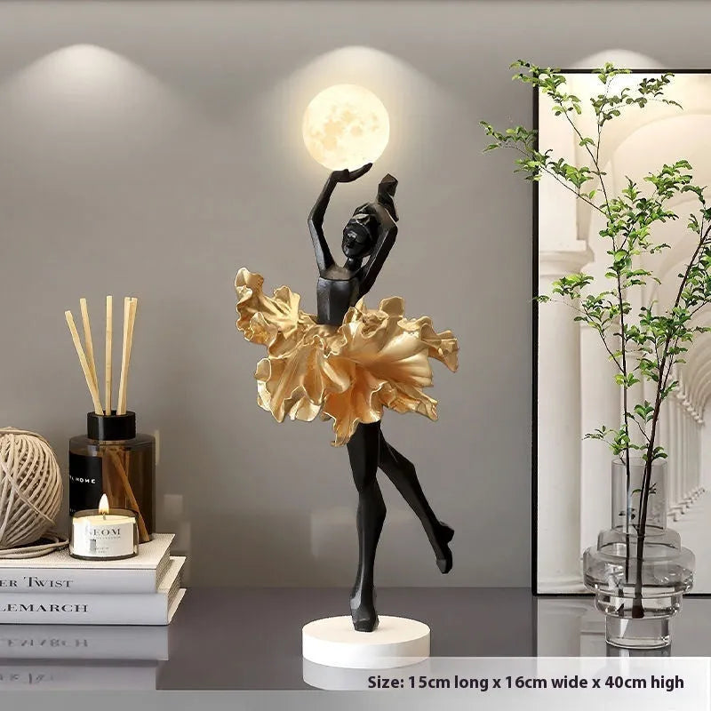Small modern resin night lamp with USB charging port in black gold colour.