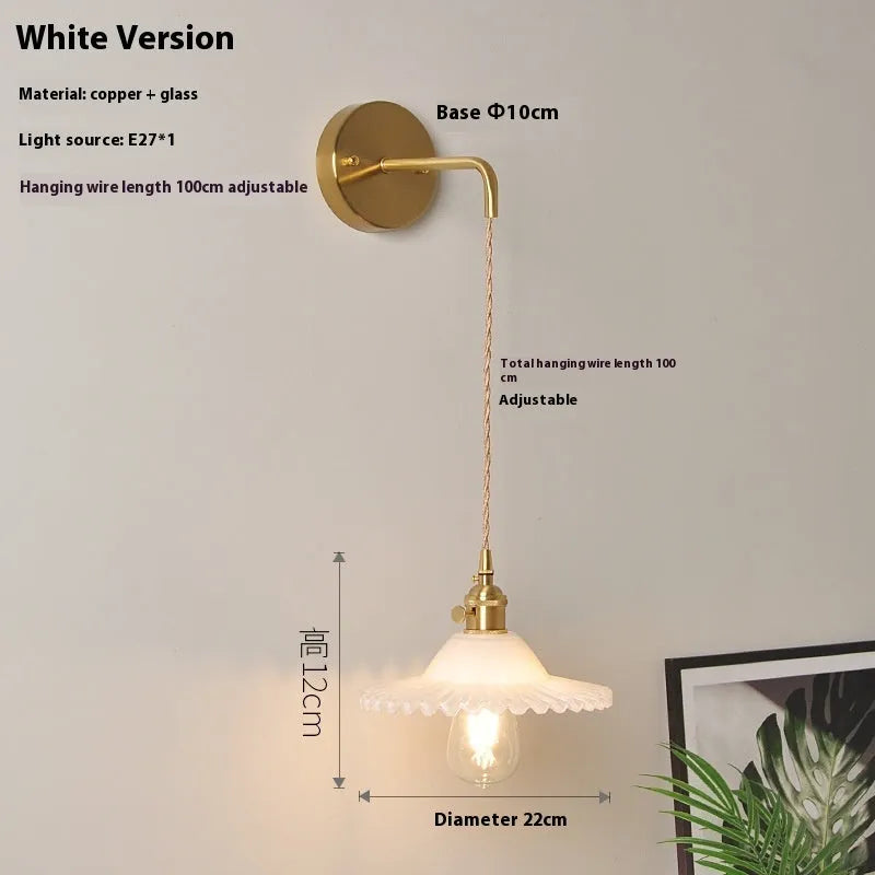 Retro brass lotus wall lamp with copper body and glass shade in 22cm diameter