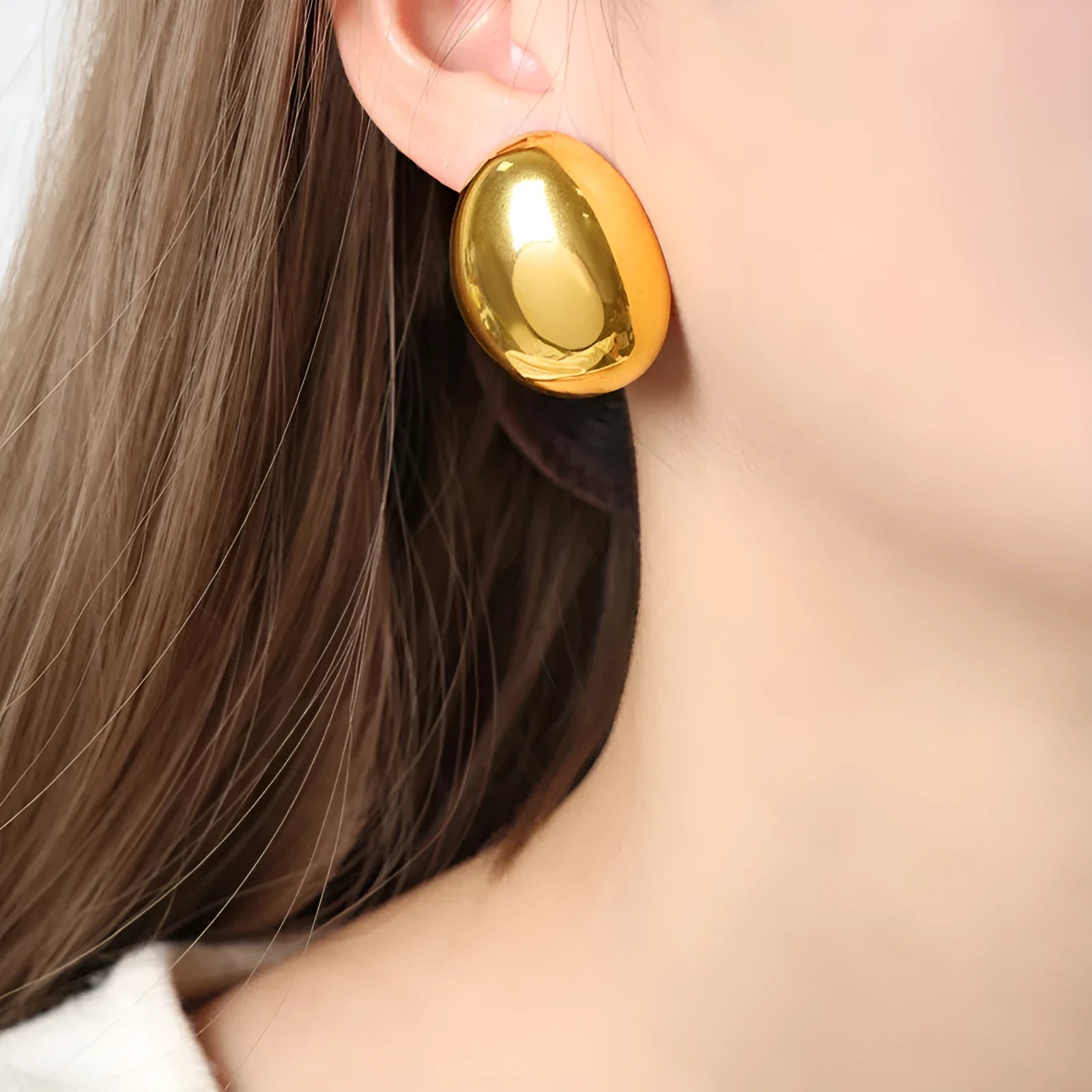 Geometric stainless steel ear studs with glazed 18K gold electroplated surface in DFE139 colour
