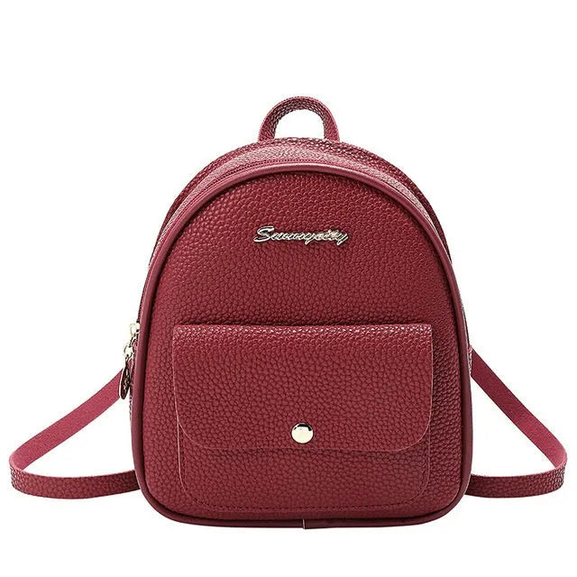 Small black PU leather women's shoulder backpack with zip, shown as a letter-style purse.