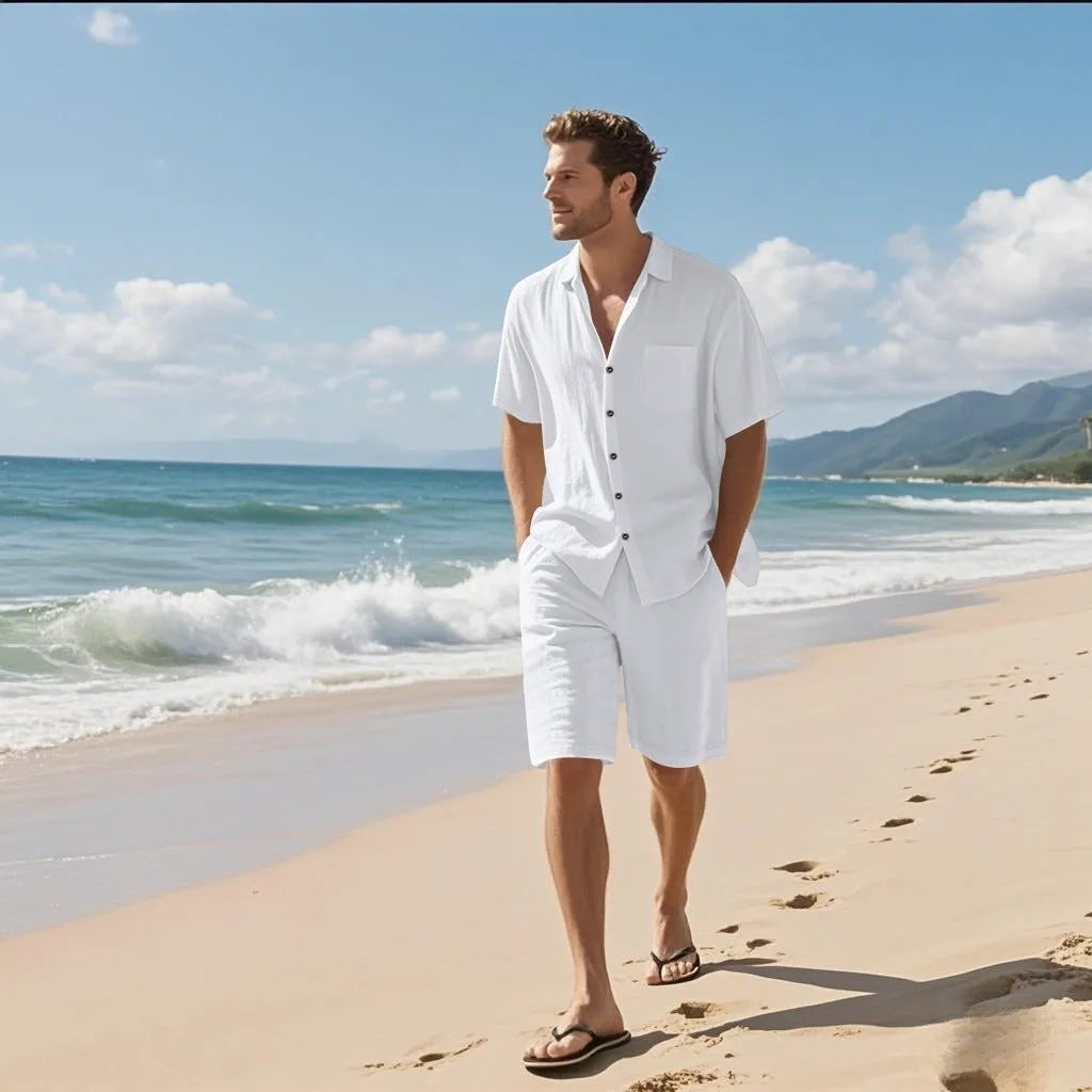 Men's light blue linen blend short sleeve shirt and matching shorts laid flat.