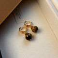 Tigereye geometric stud earrings with gold plating in brown and black colour options
