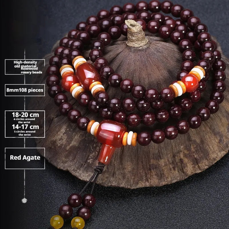 Men's rosewood 108 bead mala bracelet with a turquoise gemstone decorative centrepiece.
