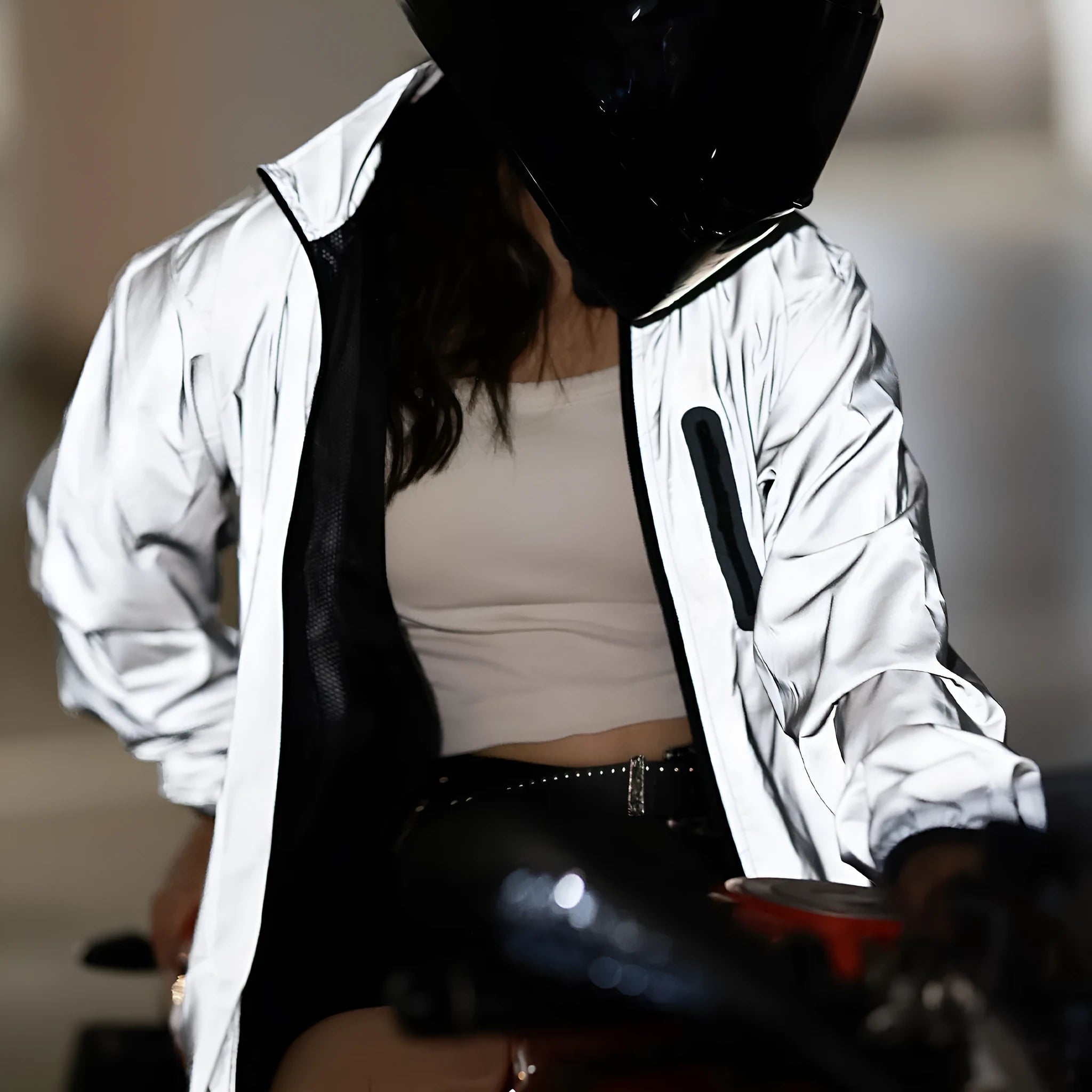 Silver waterproof polyester long sleeved windproof coat showing front design.