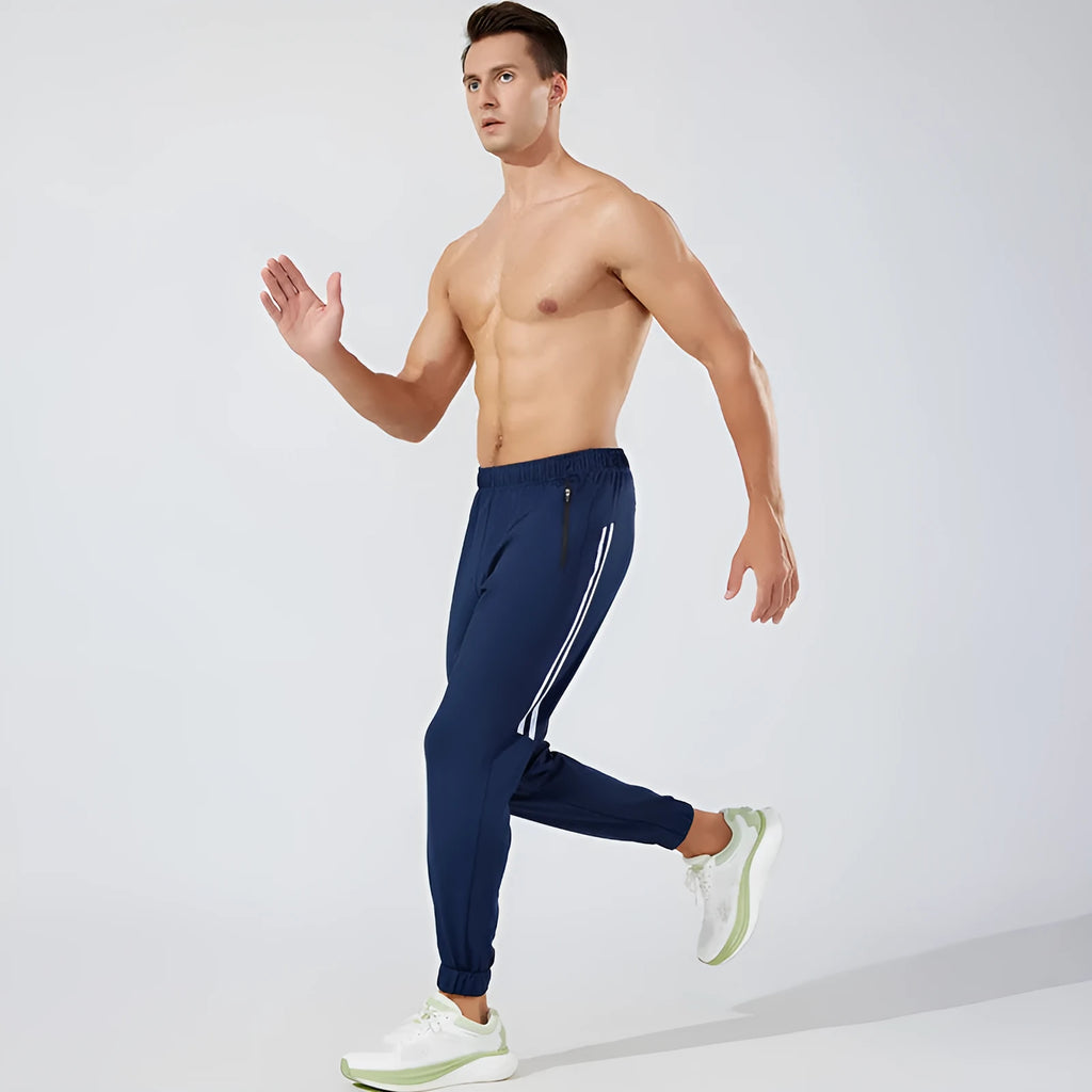 Men's black polyester running trousers with mid-waist design for exercise and sports activities