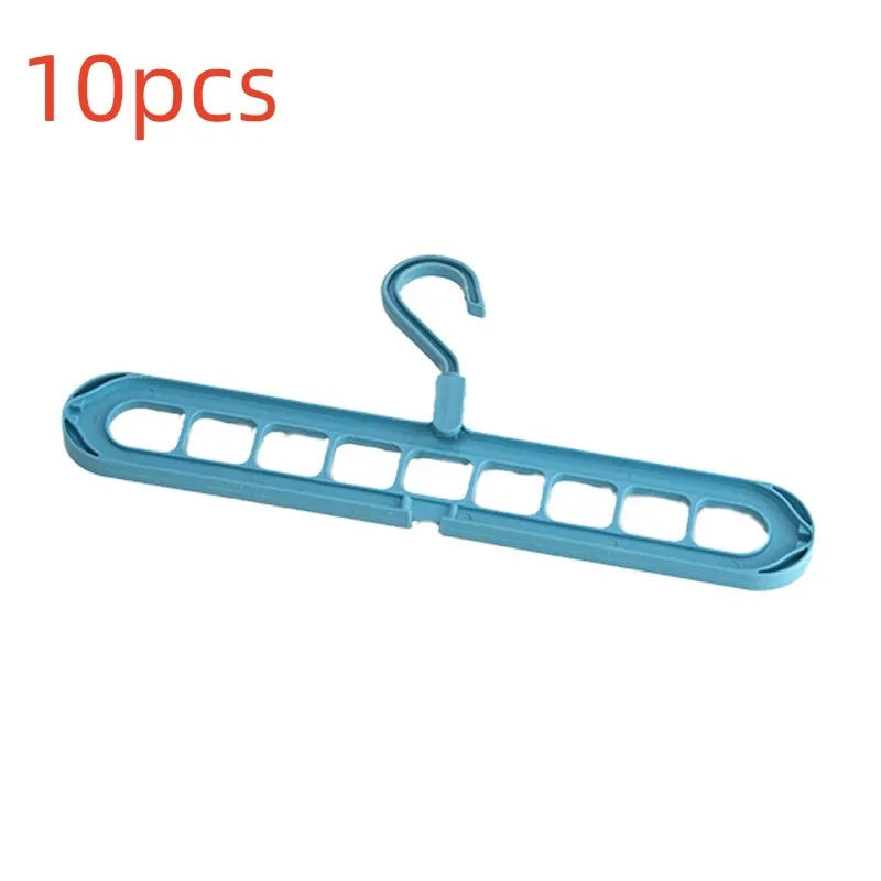 Multifunctional plastic nine-hole folding hanger for trousers, shown in beige, blue, green, pink, and grey colour options.