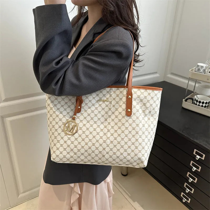 PU leather street trend shoulder bag with sewing thread detail in a choice of colours.