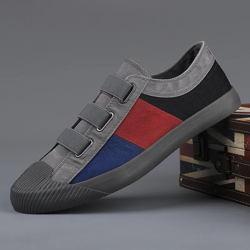Men's canvas sneakers in multiple colours with elastic band closure and vulcanised rubber soles