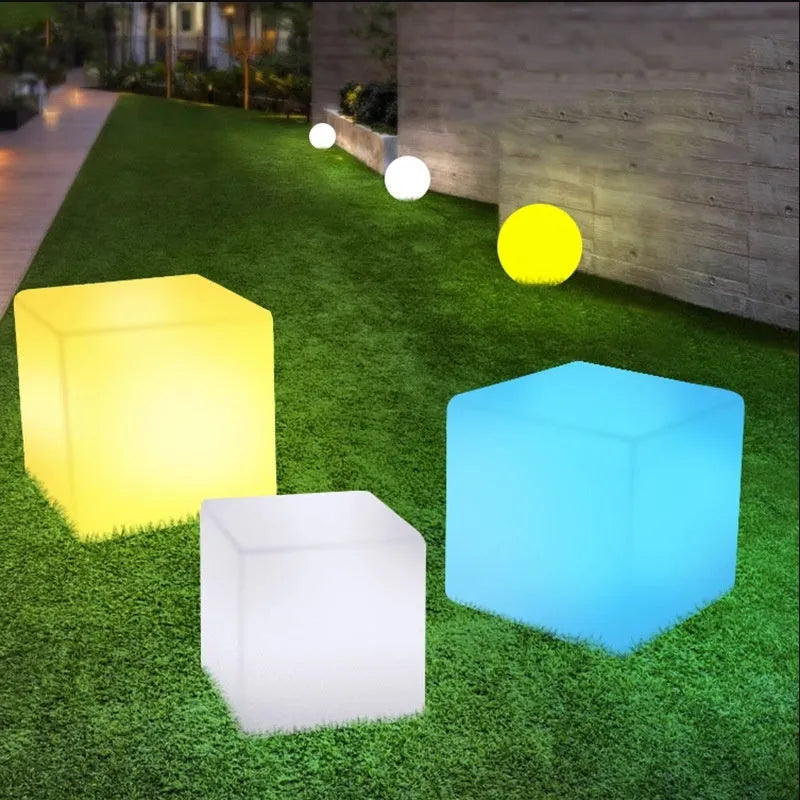 Modern square LED cube light for outdoor garden and patio use with waterproof IP65 rating.