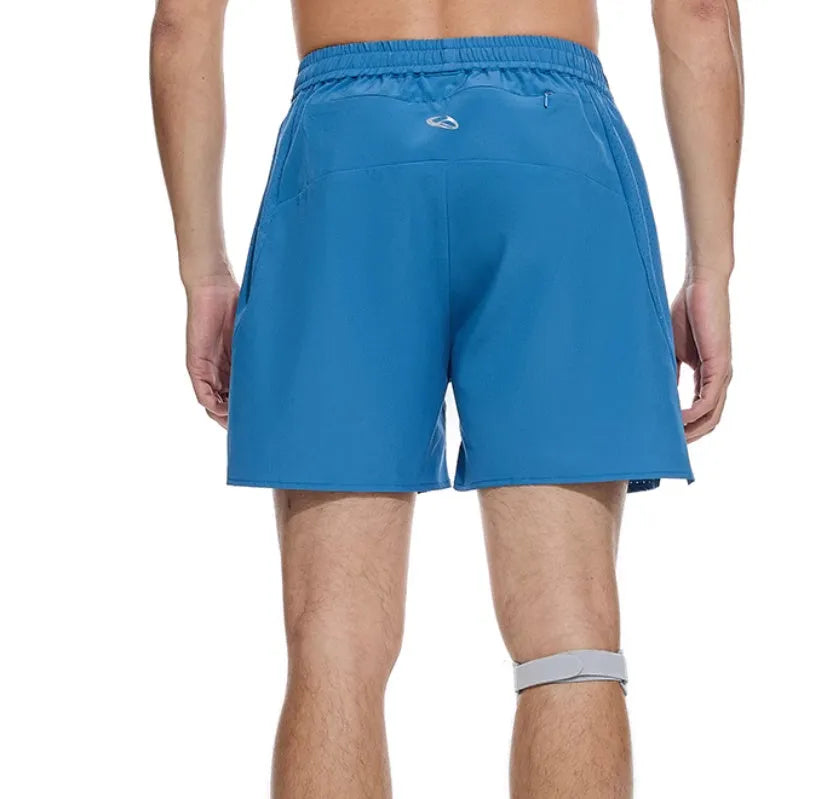 Black and blue four-point stretch running shorts with laser-cut stitching detail on a mannequin.