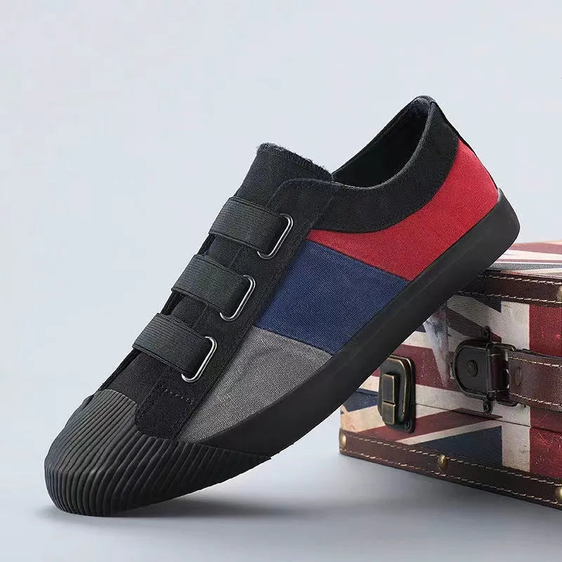 Men's canvas sneakers in multiple colours with elastic band closure and vulcanised rubber soles