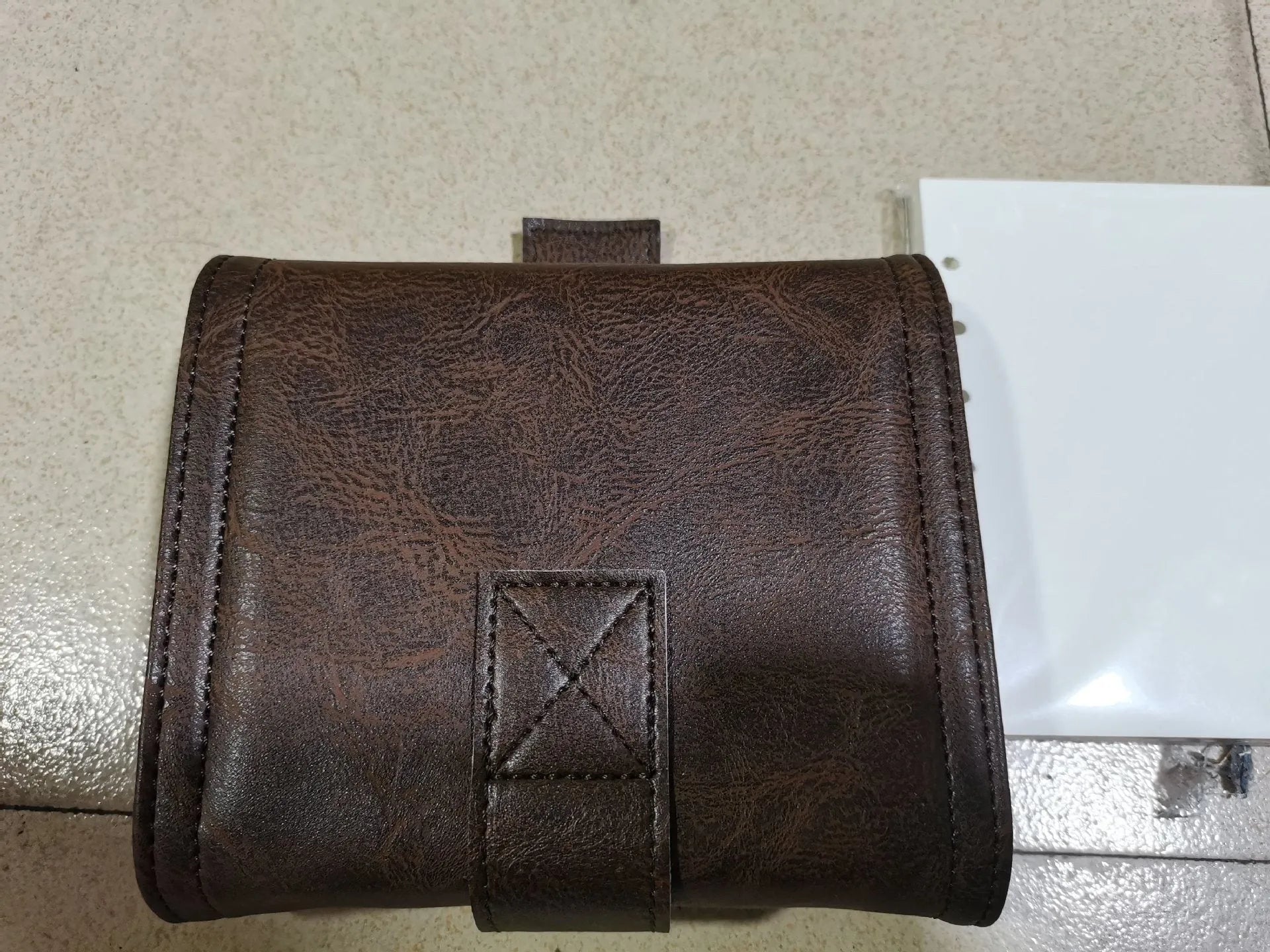 Brown A7 notebook with loose-leaf binder binding and PU cover